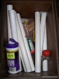 (SEC3, UNDER TABLE) BROWN PLASTIC STORAGE CONTAINER FILLED WITH SECTIONS OF PVC PIPE AND CLEANING