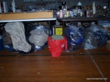 (SEC3, UNDER TABLE) LOT OF 4 CLEAR PLASTIC BAGS AND 1 RED WALGREENS BAG FILLED WITH ADULT COATS AND