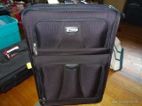 (SEC4, FLOOR) PAIR OF BLACK SOFT-SIDED SUITCASES, ONE IS CARRY-ON SIZE AND IS EMBASSY BRAND, AND ONE