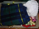 (CENTER LEFT) DOCKERS SUIT BAG, TUB CONTAINING A BLANKET, RIBBON, ELECTRICAL CORDS AND MORE!