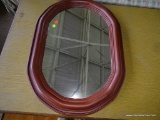 (CENTER/RIGHT OF STAGE, ON #564) OVAL SHAPED PLASTIC WOOD-GRAIN MIRROR, 21