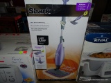 (STG 2) SHARK LIGHT & EASY STEAM MOP. HAS 180 DEGREE STEERING, CHEMICAL FREE SANITATION, AND DEEP