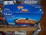 (STG 2) OSTER ELECTRIC SKILLET. BRAND NEW IN THE BOX!