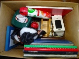 (TBL SEC4 L) BOX LOT: TISSUE BOX. AIRWICK AIR FRESHENER. NAPKIN HOLDER. PORCELAIN DOLL OF AN ESKIMO