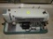 (MBTH) UNIVERSAL SEWING MACHINE IN HARD CARRYING CASE. MODEL UNL-60. INCLUDES A SAN FRANCISCO 49ER'S