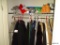 (1ST FLOOR CLOS) LO T OF MISC. CLOSET CONTENTS, INCLUDING COATS OF VARYING SIZES, NEW-IN-BOX SHOWER