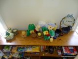 (OFF) CONTENTS ON TOP OF #120: PLUSHED FROGS. DACHSHUND IN A BASKET STYLE CLOCK. FROG TRINKET BOX.