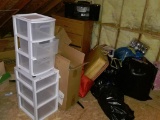 (ATTIC) SECTION TO RIGHT OF ATTIC DOOR: STEREO. LUGGAGE BAG. WHITE STACKING STORAGE CONTAINERS. 4