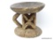 CUUNO ROUND STOOL, UNIFORM GROMETRICAL TRIANGULAR PATTERN CARVED INTO SHAFT, VISIBLE CRACKING ON