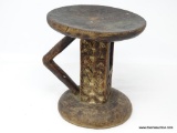 CUUNO ROUND STOOL, UNIFORMED GEOMETRICAL TRIANGULAR CARVED PATTERN IN SHAFT ; CHECKERBOARD BLACK AND