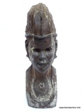 BUST, ARTIST EMMANUEL MIZHA, APPROXIMATELY 25? H WITH BEADED NECKLACE AND EARRING, FIBRE CAP,