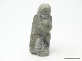 JADE SCULPTURE SITTING, EATING MELON, USING LEFT HAND APPROXIMEDELY 5.5? H SOAPSTONE $50.00-$100.00