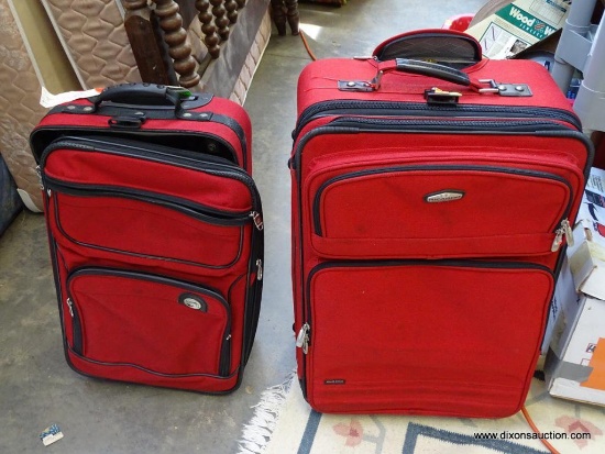 (R1) RICARDO ROLLING CLOTH SUITCASE. INCLUDES AN AMERICAN TOURISTER SUITCASE THAT FITS PERFECTLY