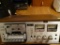 (FAM) SANSUI STEREO CASSETTE DECK MODEL SC-3100. HAS RECORDING CAPABILITIES AS WELL AS 2 MIC-IN