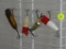 (GR) 4 VINTAGE WOODEN FISHING LURES: 2 RED AND WHITE POPPERS WITH 2 SETS OF HOOKS, HEDDON RIVER RUNT