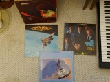 (DR, FLOOR) LOT OF RECORDS STILL IN ALBUM COVERS INCLUDING STYX, ROLLING STONES, ROD STEWART,