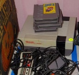 (SR) ORIGINAL NINTENDO ENTERTAINMENT SYSTEM WITH CONTROLLERS, CORDS, AND GAMES (TINY TOON ADVENTURES