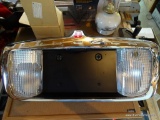 (GAR) BRAND NEW LINCOLN HEADLIGHT REPLACEMENT WITH LICENSE PLATE HOLDER. INCLUDES A LG MAGNETRON IN