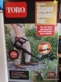 (GAR) TORO ELECTRIC SUPER BLOWER VAC. HAS BLOWING POWER OF UP TO 210 MPH. HAS BLOWER, VACUUM, AND