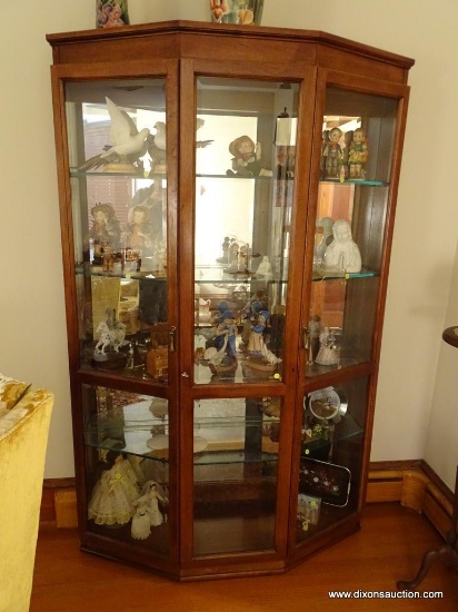 (LR) CURIO CABINET; LARGE 2 DOOR OAK CURIO CABINET WITH 4 GLASS SHELVES. HAS LIGHTED INTERIOR AND