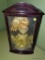 (BR3) BLONDE DOLL IN BLACK AND GOLD ATTIRE INSIDE CHERRY DOLL DISPLAY BOX; MEASURES 11