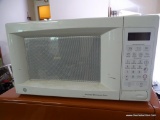 (G) GE WHITE MICROWAVE. MODEL JES831WB 001