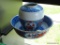 (FC) TIFFANY AND COMPANY BOWL AND VASE SET. WHITE WITH BRILLIANT BLUE TRIM AND ORANGE FLORAL