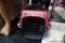 (R2) RED AND BLACK PET CARRIER; HARD-SIDED WITH WIRE MESH DOORS, TOP, AND WINDOWS. IDEAL FOR A CAT,