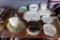 (BACK) TABLE LOT OF BAKING WARE: CORNING WARE CASSEROLE DISHES, CORNING WARE LIDDED MICROWAVEABLE