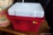 (BACK) RED AND WHITE HARD SIDED COLEMAN COOLER. MODEL # 6209.