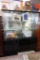 (R4) MODERN BLACK AND GLASS CURIO CABINET WITH MIRRORED BACK, LIGHTED INTERIOR, 3 SHELVES (2 ARE