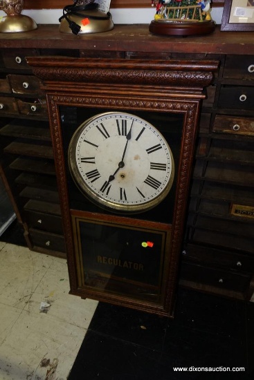 (R1) VINTAGE WALL CLOCK; UNIQUELY CARVED OAK CASE REGULATOR WALL CLOCK WITH DOUBLE PANED GLASS DOOR