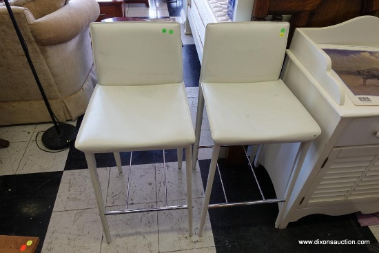 (R3) WHITE VINYL BAR STOOLS; SQUARE SEATS AND BACKS WITH VINYL COVERED LEGS AND CHROME FOOTRESTS.