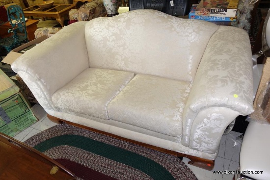 (R1) CREAM-COLORED LOVESEAT; 2 CUSHION SEAT WITH TIGHT BACK, SEMI-ROLLED ARMS, AND BRACKET