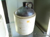 (FC) STONEWARE MILK JUG; HANDLED JUG HAS RICH BROWN TOP AND THICKLY INSULATED STONE SIDES. MEASURES