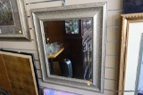 (W) FRAMED BEVELLED GLASS MIRROR IN SILVER TONED FRAME: 24