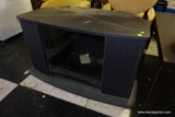 (R1) BLACK PAINTED AND 1 GLASS DOOR ENTERTAINMENT STAND. HAS ROOM FOR AN INTERIOR SHELF: 36