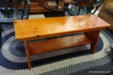 (R2) PINE BENCH WITH TRESTLE BASE; ALL WOOD, LIKELY BENCH CRAFTED. MEASURES 48