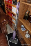 (R2) SHARK STEAM MOP; MODEL # S3251. PURPLE AND GREY IN COLOR, COMES WITH ONE REMOVABLE AND MACHINE