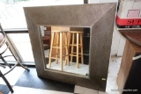 (R5) LARGE FRAMED AND BEVELLED GLASS MIRROR IN MODERNISTIC FRAME: 41