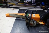 (BACK) STIHL 021 CHAINSAW IN ORIGINAL HARD VINYL CARRYING CASE.