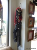 (WIN) HANGING HALLOWEEN DECORATION; PIRATE SKELETON WITH SMALLER TUXEDO AND BOW TIE SKELETON.