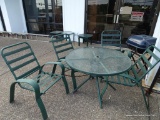 (OUT) PATIO SET; ROUND GLASS TOP TABLE WITH 4 MATCHING CHAIRS. GREEN IN COLOR, TABLE MEASURES 40