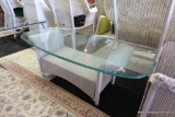 (R4) GLASS-TOP WICKER COFFEE TABLE; RECTANGULAR TOP WITH ROUNDED CORNERS, BEVELED GLASS. MEASURES