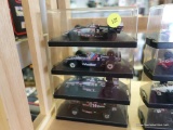 (SR1) LOT OF FOUR 1:43 SCALE INDY 500 CARS IN HARD PLASTIC PROTECTIVE CASES: 2 ARE HAVOLINE, 1 IS