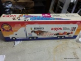 (SR2) 1995 EXXON COLLECTORS EDITION RACE CAR CARRIER 4TH IN A SERIES. FEATURES OPENING DOOR, WORKING