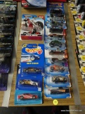 (SR2) HOT WHEELS LOT: 8 BRAND NEW IN THE PACKAGES STOCK CARS FROM THE 80'S-90'S. 1 LIMITED EDITION