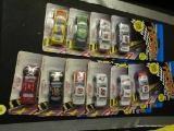 (SR2) LOT OF 12 PIT ROW STOCK CARS BRAND NEW IN THE PACKAGES