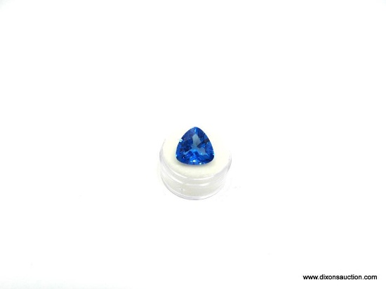 NEXT IS A BEAUTIFUL LONDON BLUE TOPAZ TRILLIANT CUT GEMSTONE THAT WEIGHS IN AT 12.345 CARATS. THIS