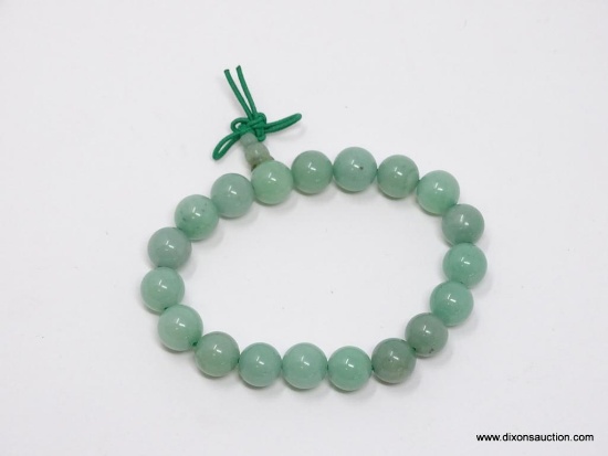 GREEN JADE BEADED EXPANSION BRACELET.